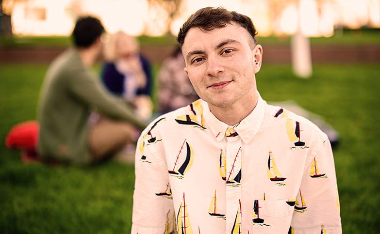 young-man-smiling-outside